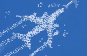 Creative synthesis, hand-painted a big bubble airplane in the sky – photo synthesis